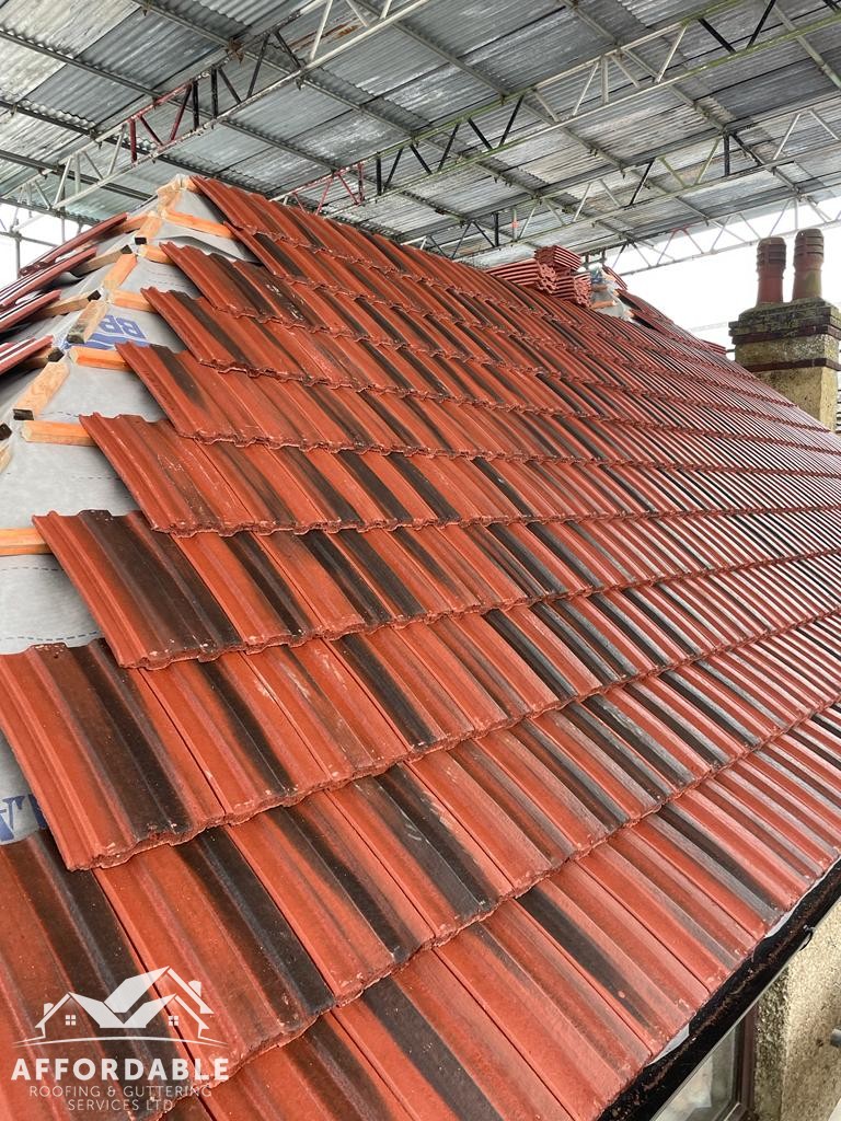 Pitched and tiled roof repair